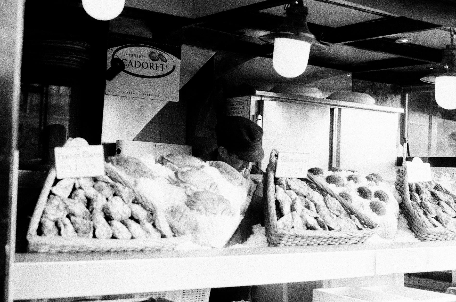 Fresh cheese and bread at a Paris food market