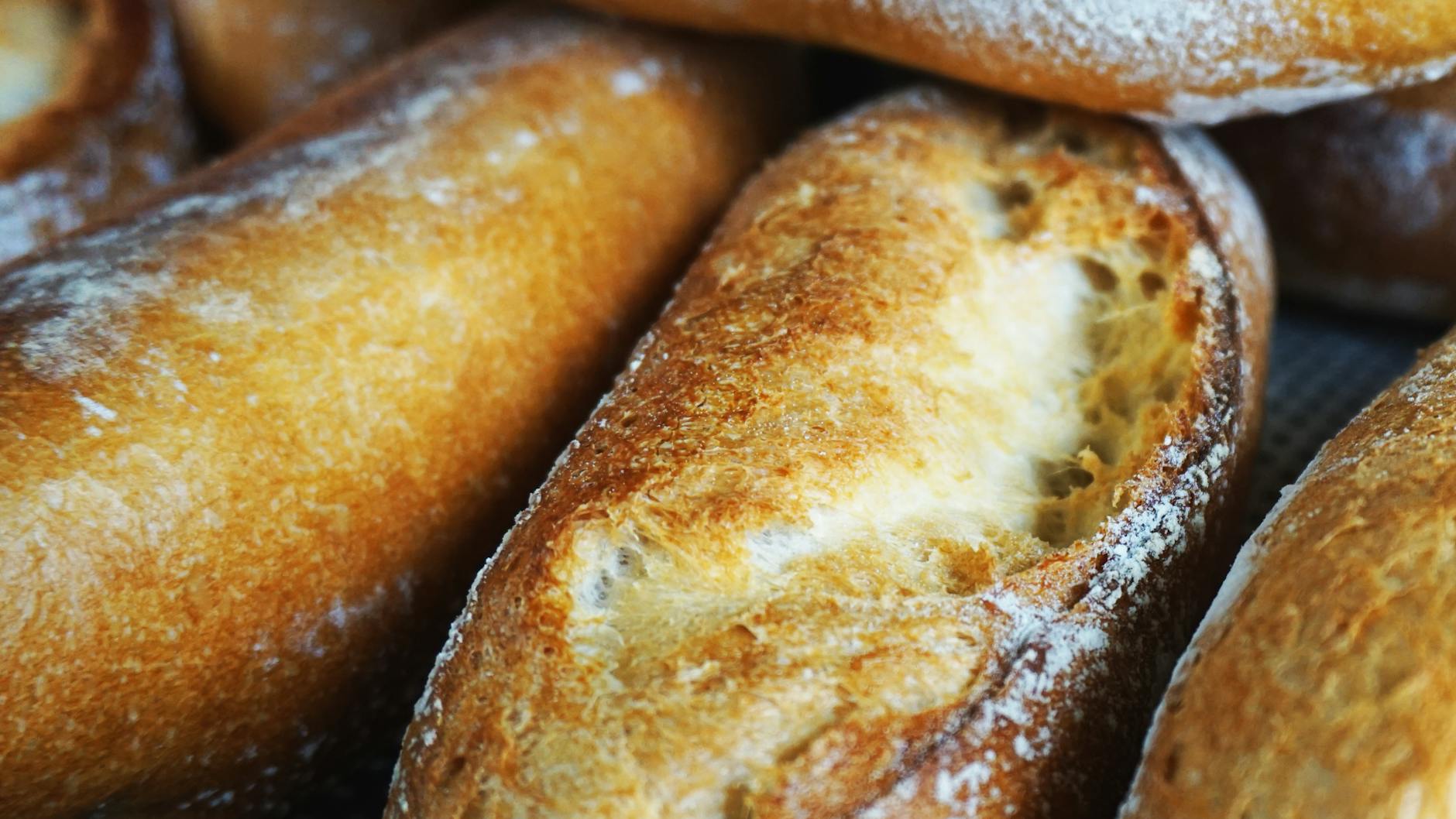 Freshly baked French baguettes at a traditional Paris boulangerie