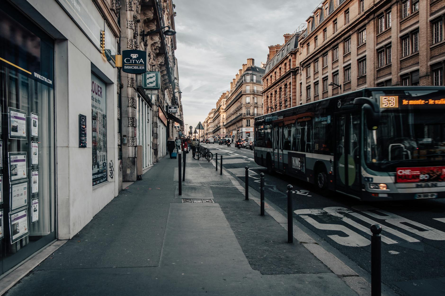Paris city bus on a bustling street - part of the comprehensive public transport network