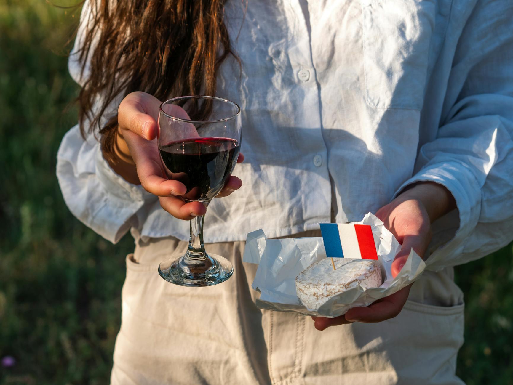 French cheese and wine platter showcasing artisanal varieties found across Paris