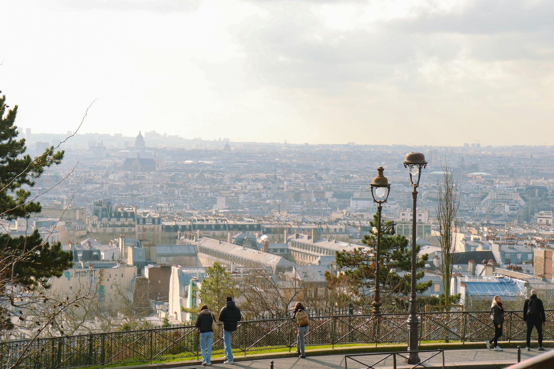 Twisting cobblestone streets of Montmartre above the foot of the butte