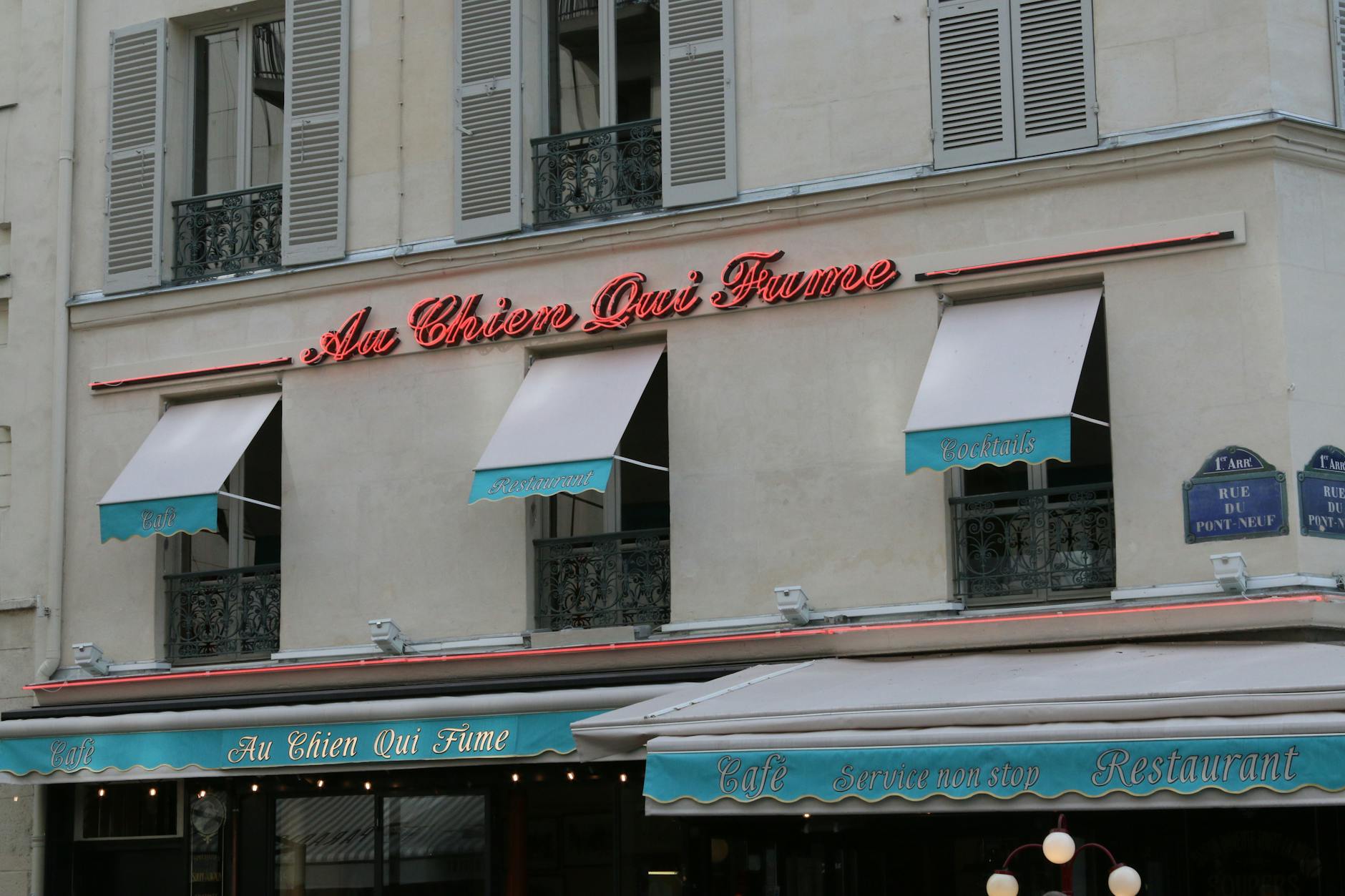 Lunch counters serving several cuisines at Marche des Enfants Rouges in Paris