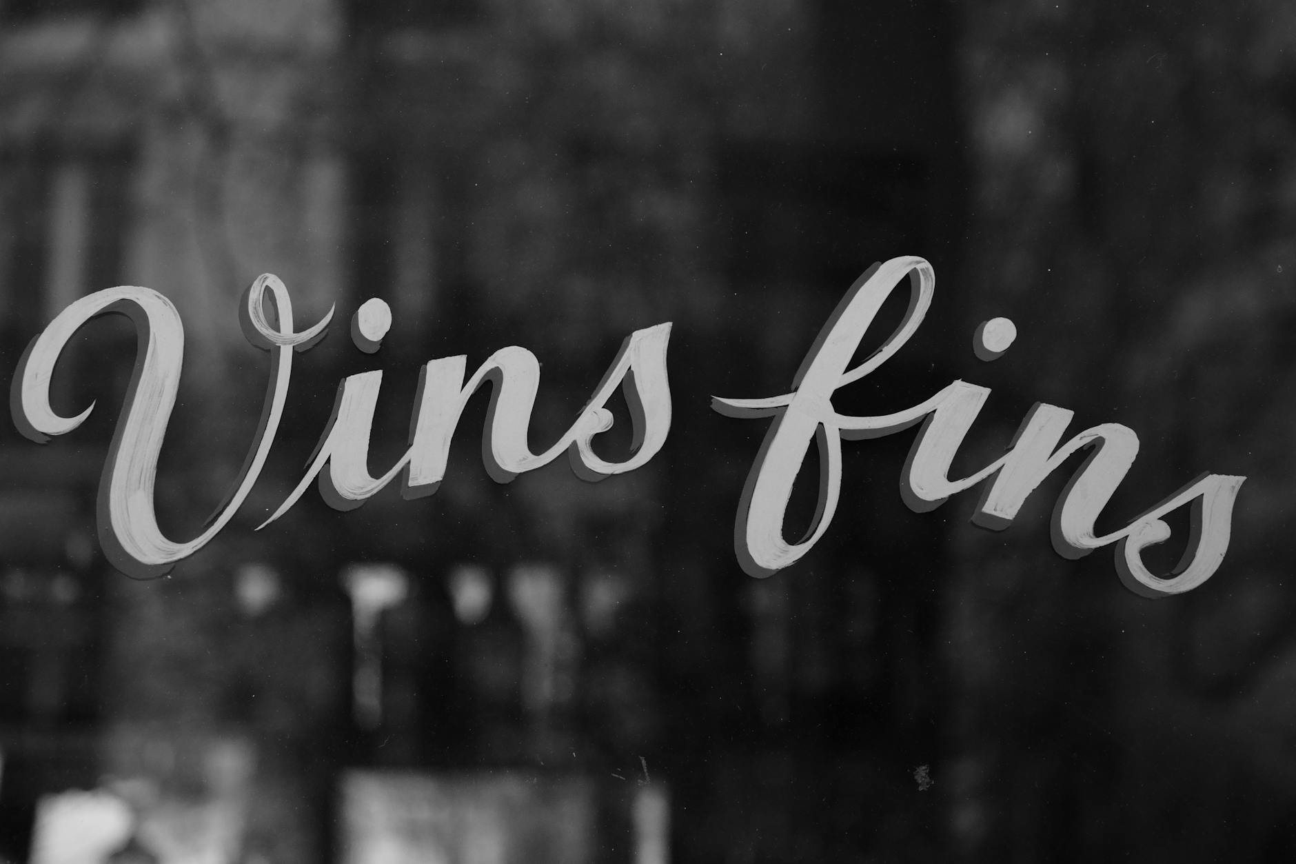 An 11th-arrondissement natural-wine bar at 9pm, full of locals drinking