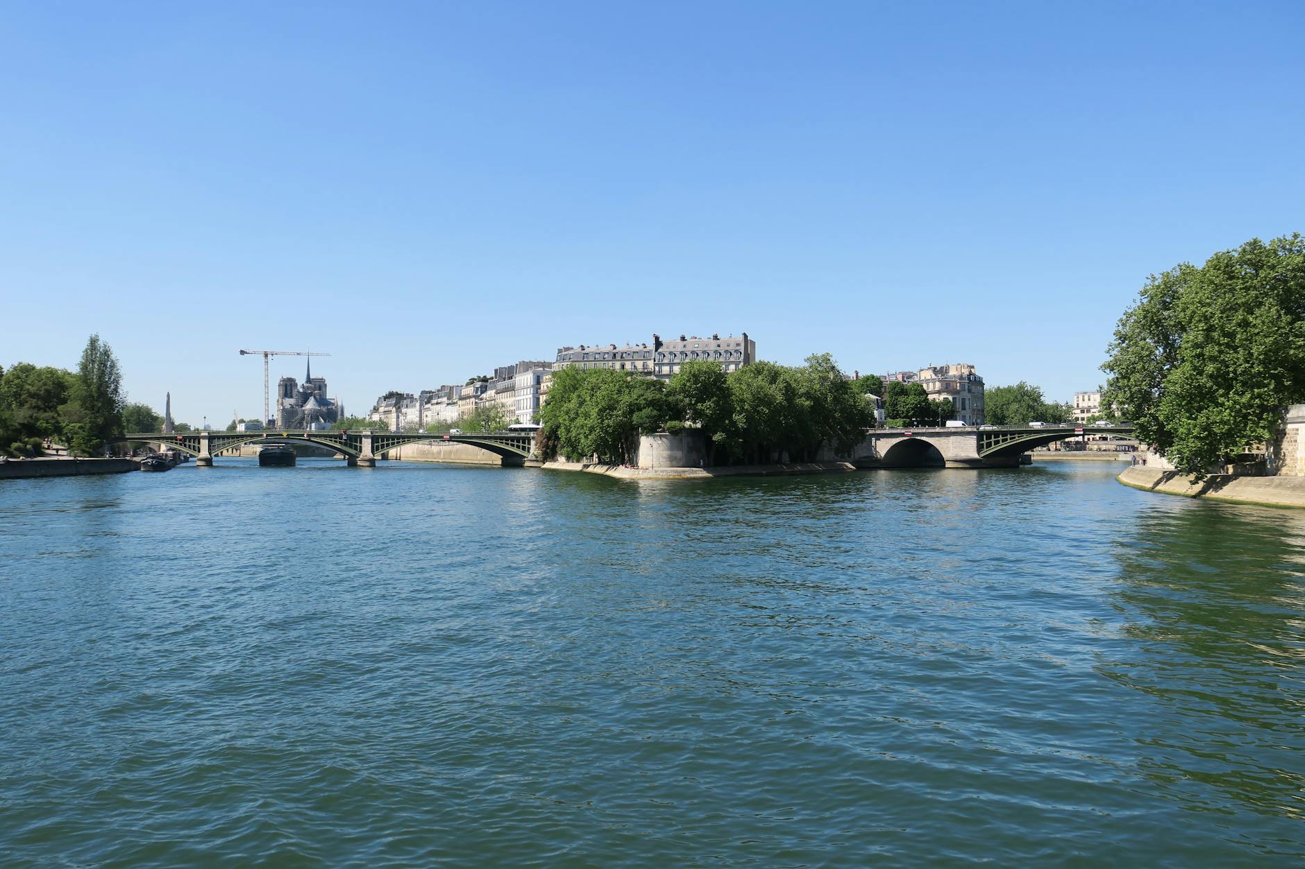 Visitor walking near Notre-Dame on Ile de la Cite, Paris