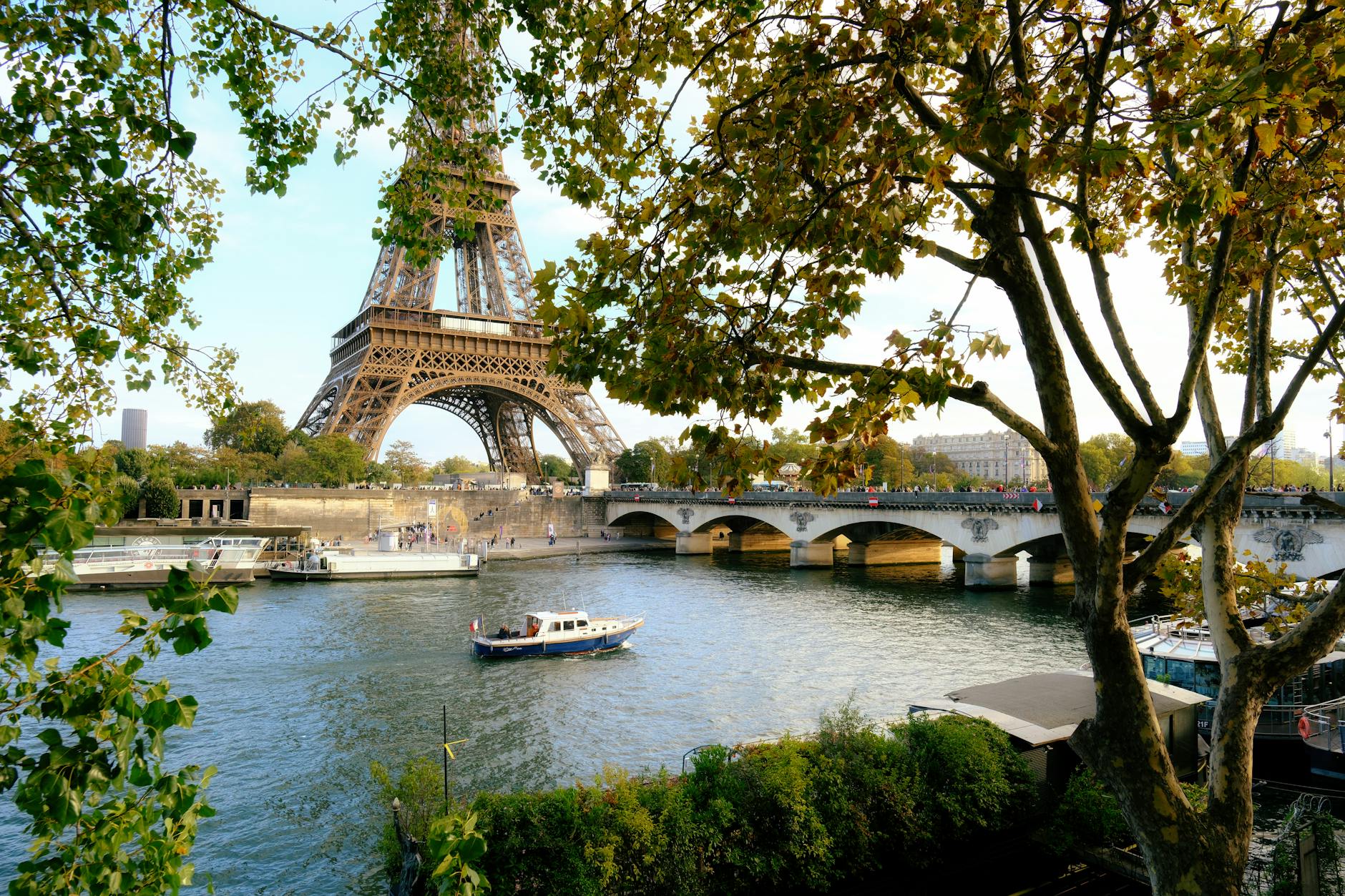 A Paris rooftop skyline with the Eiffel Tower, the distant end of the hotels with eiffel tower view spectrum