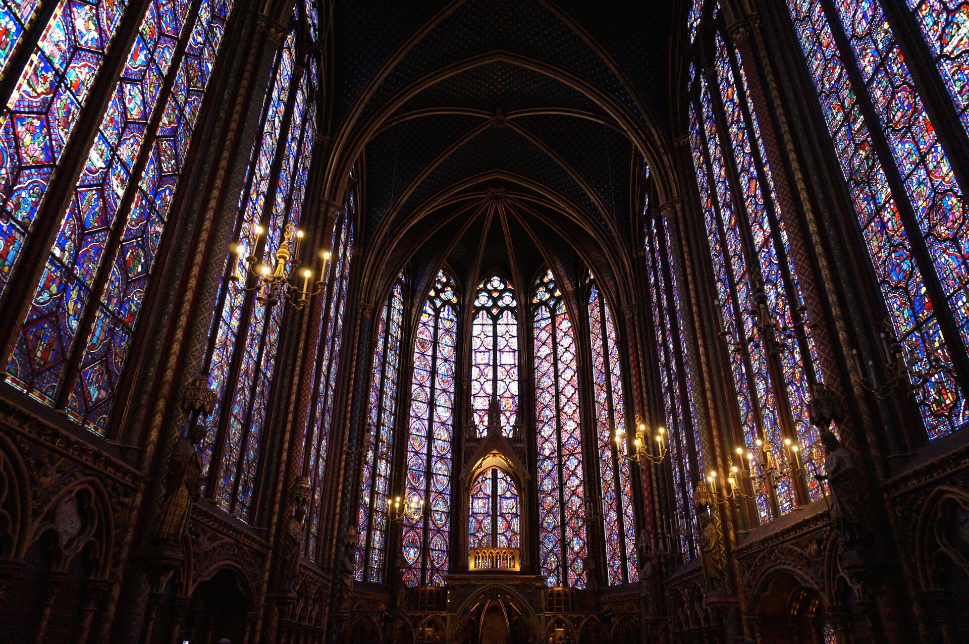 The upper chapel of Sainte-Chapelle, its walls made almost entirely of tall stained-glass windows